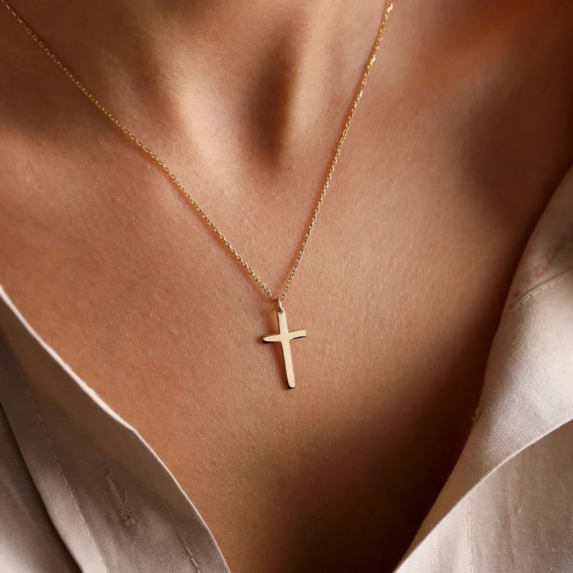 CROSS NECKLESS