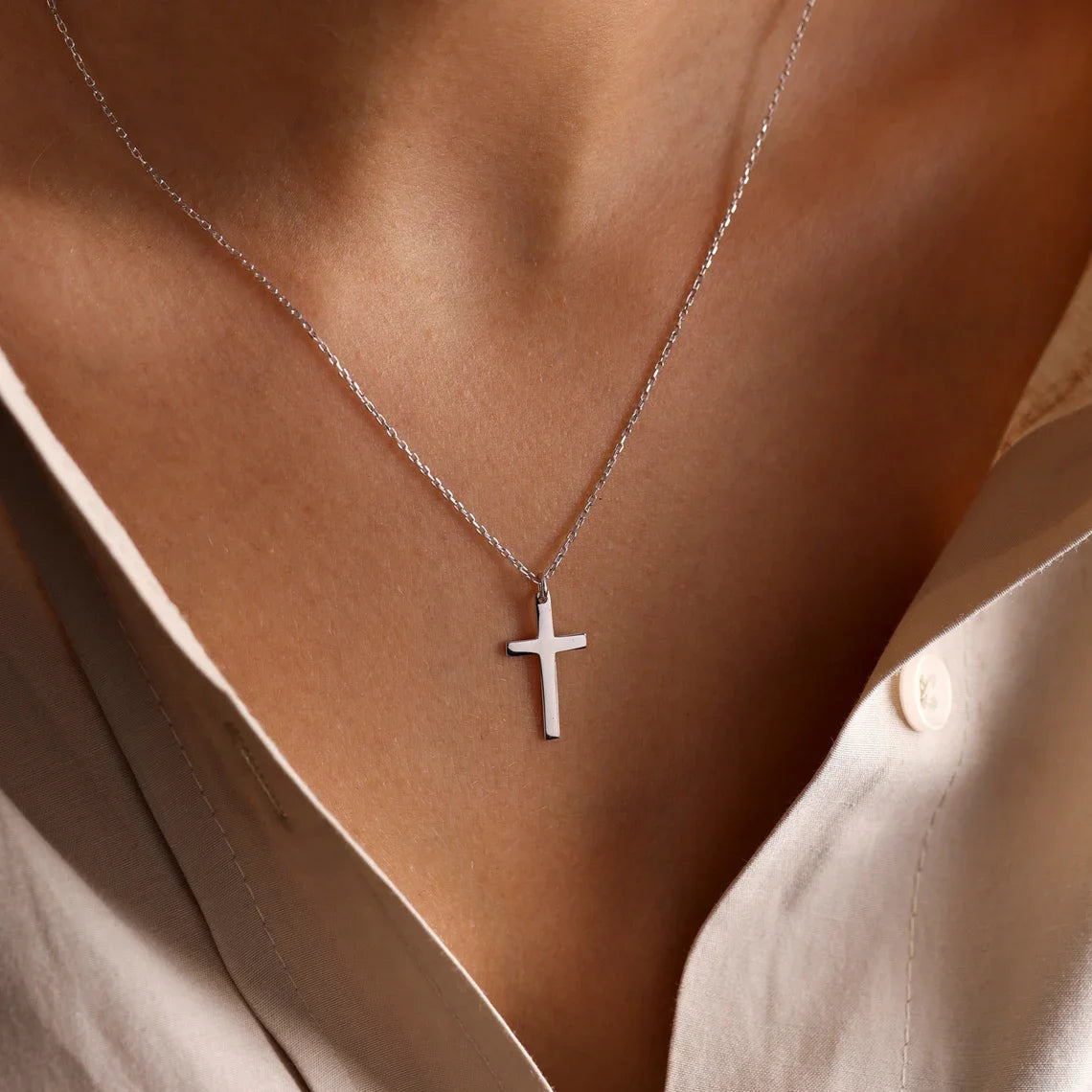 CROSS NECKLESS