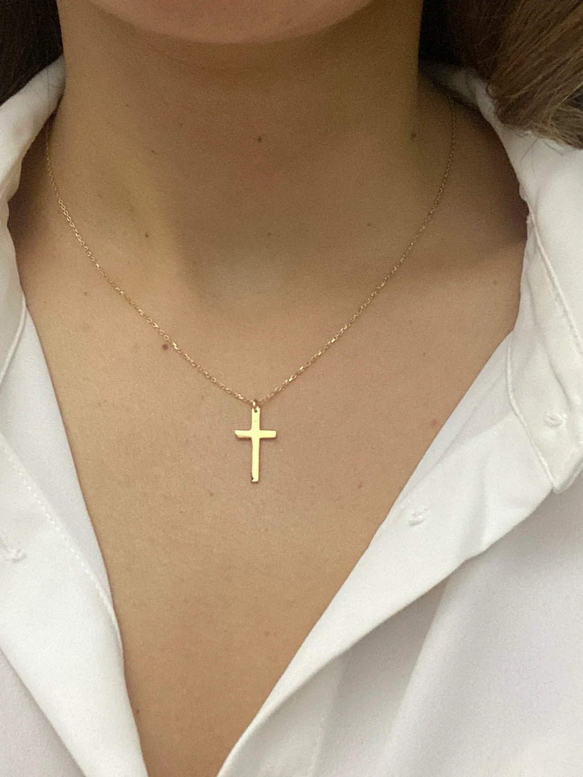 CROSS NECKLESS