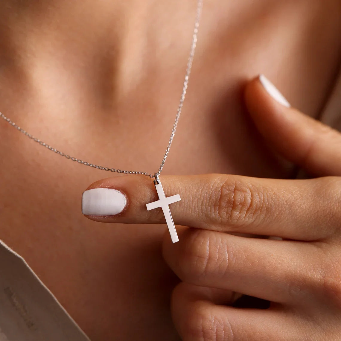 CROSS NECKLESS
