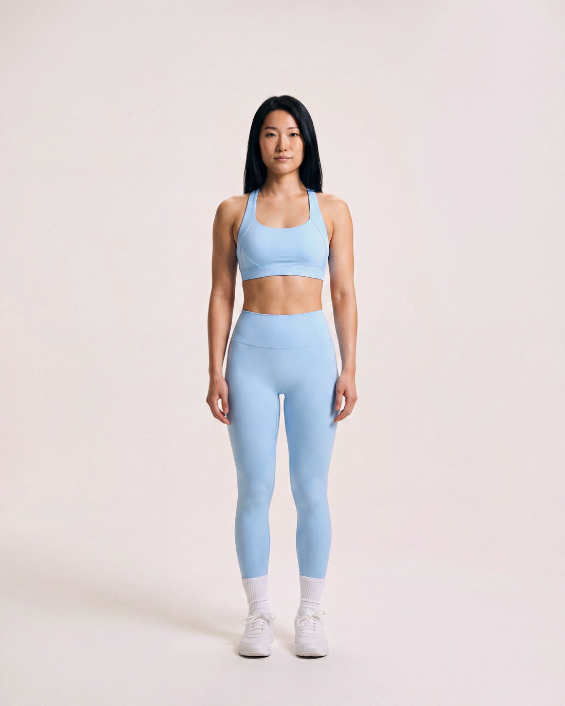 VARCEA Sky Blue cross-back sports bra – front view, full body